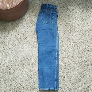 Men's Rustler brand jeans.